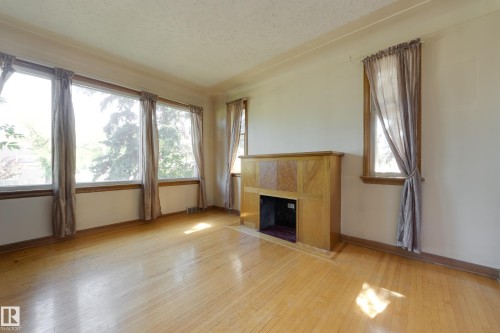 12202 127 Street Nw, Edmonton, AB - Indoor With Fireplace