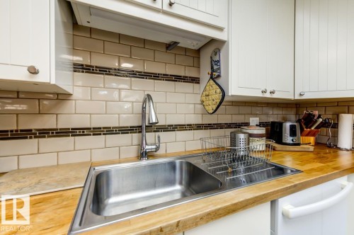 3803 108 Street Nw, Edmonton, AB - Indoor Photo Showing Kitchen With Double Sink