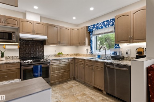 #1 10 Grange Dr, St. Albert, AB - Indoor Photo Showing Kitchen With Double Sink