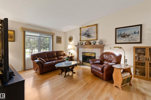 #1 10 Grange Dr, St. Albert, AB - Indoor Photo Showing Living Room With Fireplace