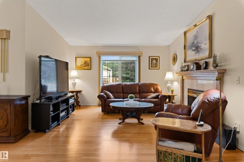 #1 10 Grange Dr, St. Albert, AB - Indoor Photo Showing Living Room With Fireplace