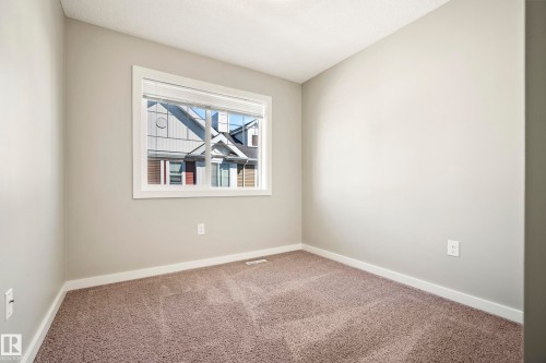 #82 2803 James Mowatt Trail Sw, Edmonton, AB - Indoor Photo Showing Other Room