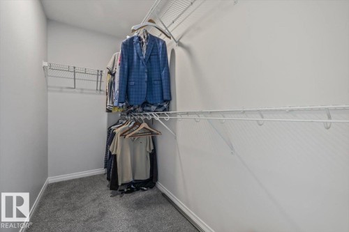 Built-in wire shelving and hanging rods - 1014 Daniels Loop Sw, Edmonton, AB - Indoor With Storage