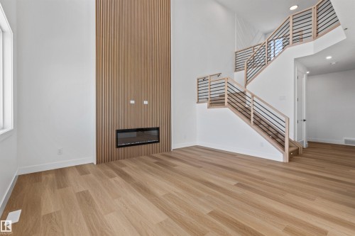 5 Mockingbird Crescent, Fort Saskatchewan, AB - Indoor Photo Showing Other Room With Fireplace