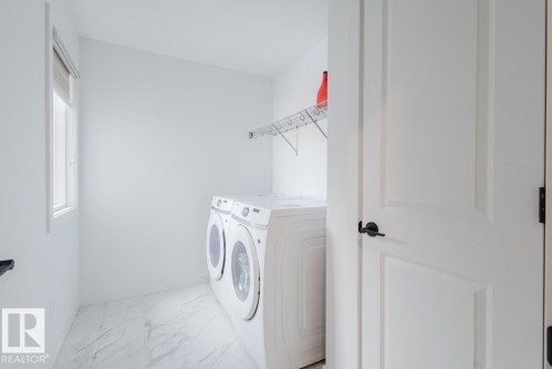6411 27 Avenue Sw, Edmonton, AB - Indoor Photo Showing Laundry Room