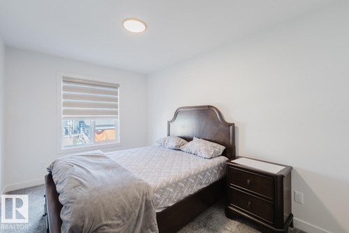 6411 27 Avenue Sw, Edmonton, AB - Indoor Photo Showing Bedroom