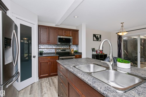4120 50 Street, Gibbons, AB - Indoor Photo Showing Kitchen With Double Sink