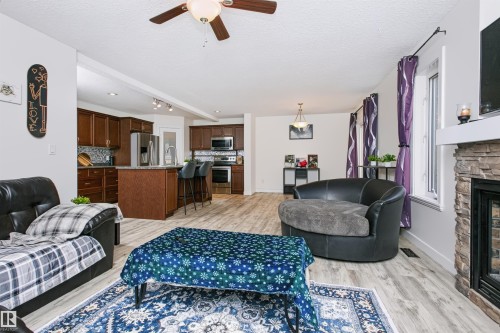 4120 50 Street, Gibbons, AB - Indoor Photo Showing Living Room With Fireplace