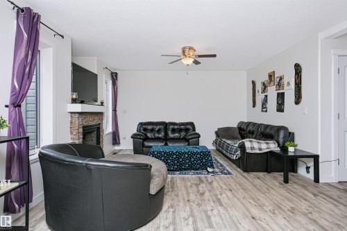 4120 50 Street, Gibbons, AB - Indoor Photo Showing Other Room With Fireplace