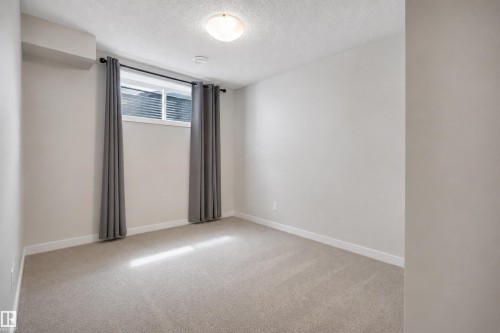 648 Orchards Boulevard Sw, Edmonton, AB - Indoor Photo Showing Other Room