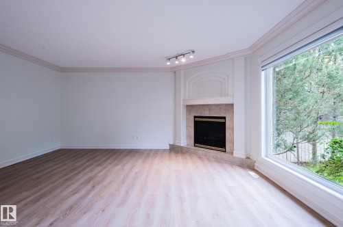 310 Livingstone Court Nw, Edmonton, AB - Indoor With Fireplace