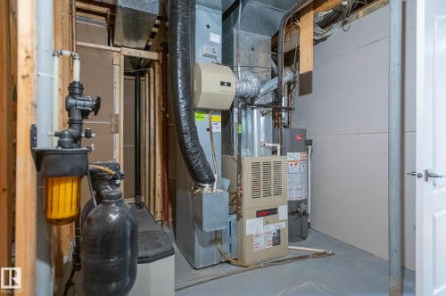 310 Livingstone Court Nw, Edmonton, AB - Indoor Photo Showing Basement