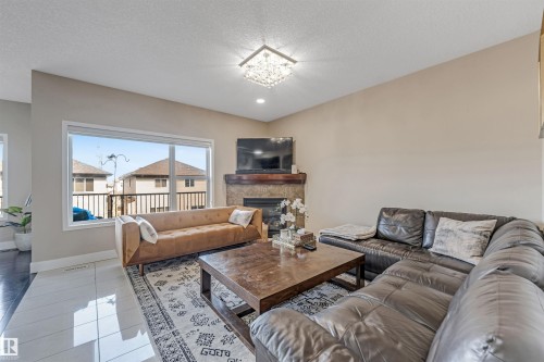 5156 2 Avenue Sw, Edmonton, AB - Indoor Photo Showing Living Room With Fireplace