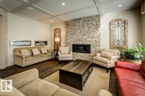 2047 90 Street Sw, Edmonton, AB - Indoor Photo Showing Living Room With Fireplace