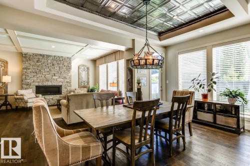 2047 90 Street Sw, Edmonton, AB - Indoor Photo Showing Dining Room With Fireplace