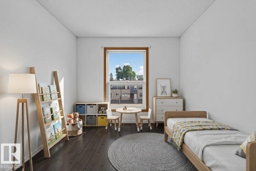 Dark wood-finish flooring with crisp white walls - 23 Willowdale Place Nw, Edmonton, AB 