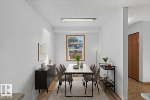 Recessed rectangular lighting fixture illuminating the space - 23 Willowdale Place Nw, Edmonton, AB 
