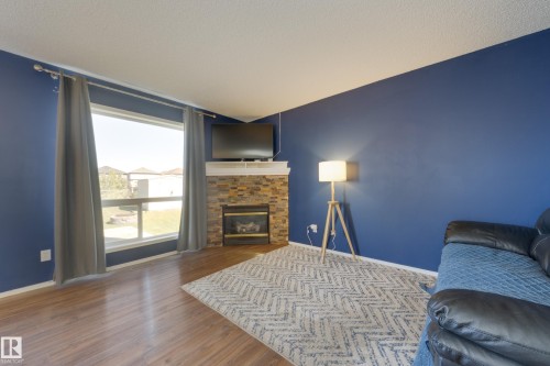 13086 162A Avenue Nw, Edmonton, AB - Indoor Photo Showing Living Room With Fireplace