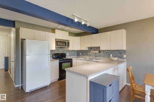 13086 162A Avenue Nw, Edmonton, AB - Indoor Photo Showing Kitchen With Double Sink