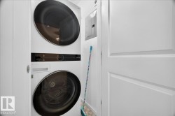 Integrated stackable washer and dryer unit - 