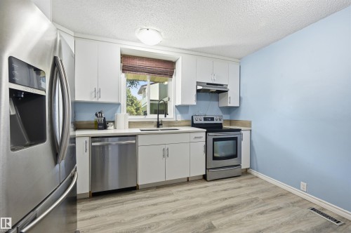 8423 Mill Woods Road Nw, Edmonton, AB - Indoor Photo Showing Kitchen With Stainless Steel Kitchen With Double Sink
