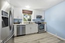 8423 Mill Woods Road Nw, Edmonton, AB  - Indoor Photo Showing Kitchen With Stainless Steel Kitchen With Double Sink 