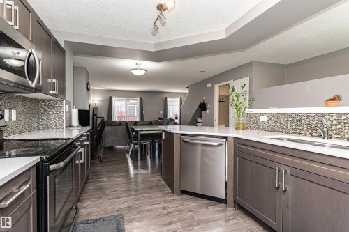 #22 4029 Orchards Dr Sw, Edmonton, AB - Indoor Photo Showing Kitchen With Double Sink With Upgraded Kitchen