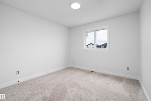 525 Robinson Boulevard, Leduc, AB - Indoor Photo Showing Other Room