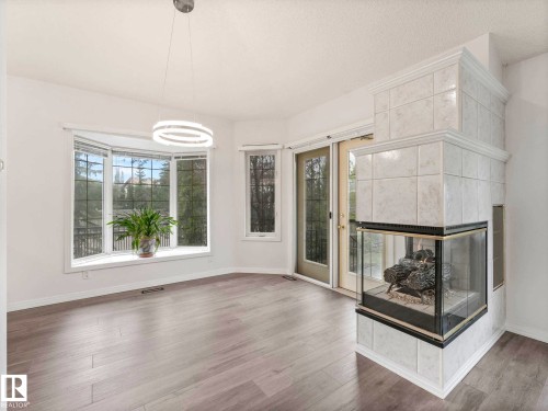1217 115A Street Nw, Edmonton, AB - Indoor Photo Showing Living Room With Fireplace