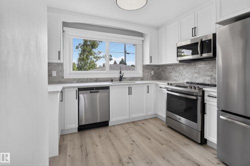 7108 90 Avenue Nw, Edmonton, AB - Indoor Photo Showing Kitchen With Stainless Steel Kitchen With Upgraded Kitchen