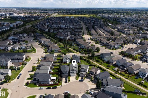 Aerial capture of a residential neighborhood with varied architectural styles and mature landscaping - 16515 139 Street Nw, Edmonton, AB - Outdoor With View