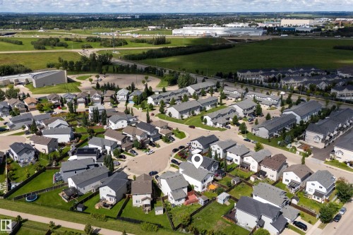Residential neighborhood with varying home styles and surrounding green spaces - 16515 139 Street Nw, Edmonton, AB - Outdoor With View