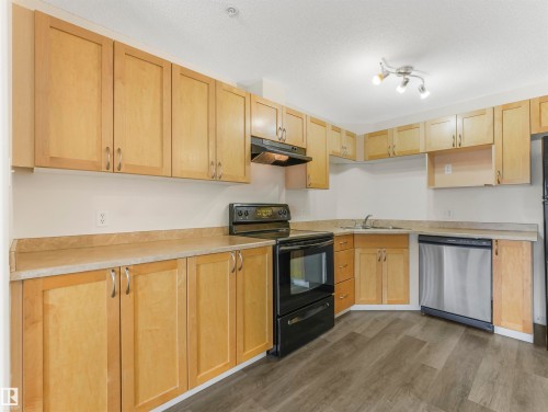 #216 111 Edwards Dr Sw, Edmonton, AB - Indoor Photo Showing Kitchen