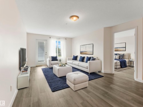 #216 111 Edwards Dr Sw, Edmonton, AB - Indoor Photo Showing Living Room