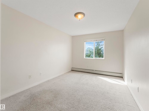 #216 111 Edwards Dr Sw, Edmonton, AB - Indoor Photo Showing Other Room
