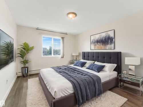 #216 111 Edwards Dr Sw, Edmonton, AB - Indoor Photo Showing Bedroom