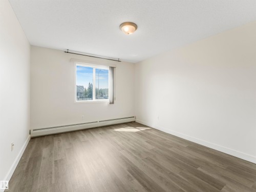 #216 111 Edwards Dr Sw, Edmonton, AB - Indoor Photo Showing Other Room