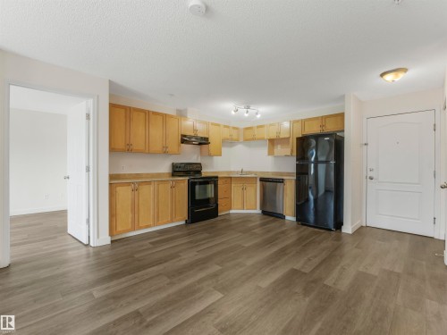 #216 111 Edwards Dr Sw, Edmonton, AB - Indoor Photo Showing Kitchen