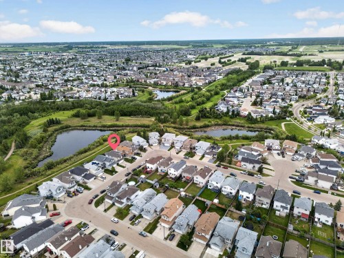 Residential neighborhood with green spaces and water features - 2518 33A Avenue Nw, Edmonton, AB - Outdoor With View