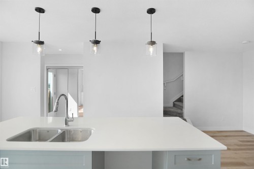 259 Falcon Crescent, Leduc, AB - Indoor Photo Showing Kitchen With Double Sink With Upgraded Kitchen