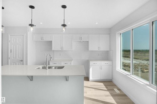 259 Falcon Crescent, Leduc, AB - Indoor Photo Showing Kitchen With Double Sink With Upgraded Kitchen