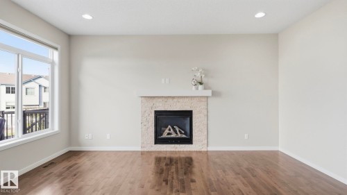 1832 56 Street Sw, Edmonton, AB - Indoor Photo Showing Living Room With Fireplace