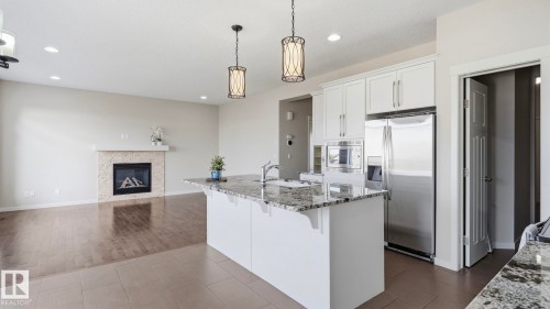 1832 56 Street Sw, Edmonton, AB - Indoor Photo Showing Kitchen With Fireplace With Upgraded Kitchen