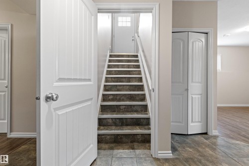 Stairwell to basement with suite potential, and second laundry area. - 10634 155 Street Nw, Edmonton, AB - Indoor Photo Showing Other Room