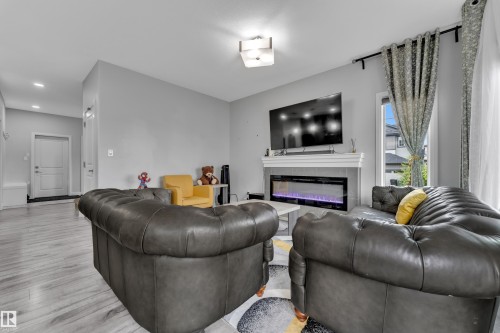 7245 Chivers Place Sw, Edmonton, AB - Indoor Photo Showing Living Room With Fireplace