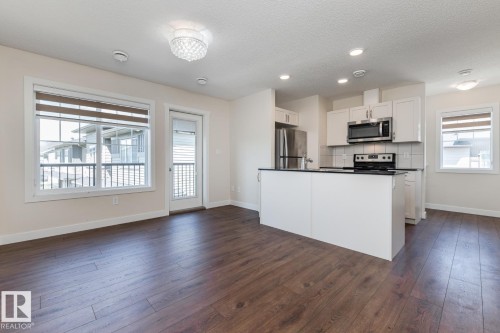 #81 1530 Tamarack Bv Nw, Edmonton, AB - Indoor Photo Showing Kitchen With Stainless Steel Kitchen