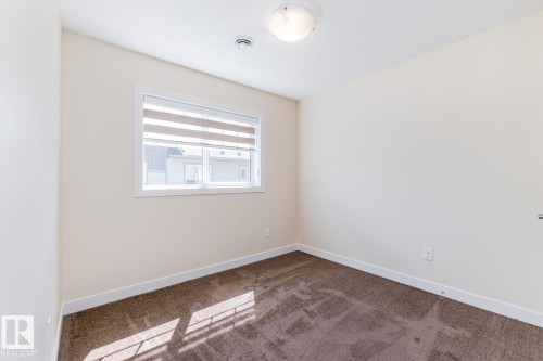#81 1530 Tamarack Bv Nw, Edmonton, AB - Indoor Photo Showing Other Room