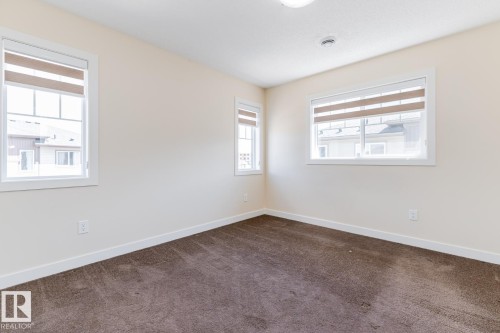 #81 1530 Tamarack Bv Nw, Edmonton, AB - Indoor Photo Showing Other Room