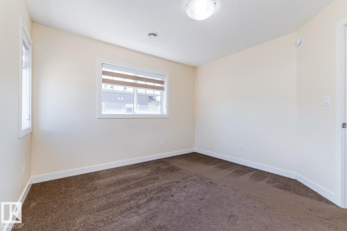 #81 1530 Tamarack Bv Nw, Edmonton, AB - Indoor Photo Showing Other Room
