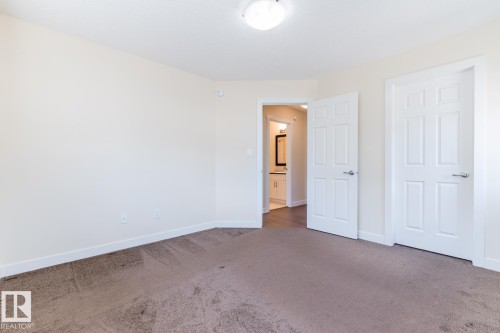 #81 1530 Tamarack Bv Nw, Edmonton, AB - Indoor Photo Showing Other Room